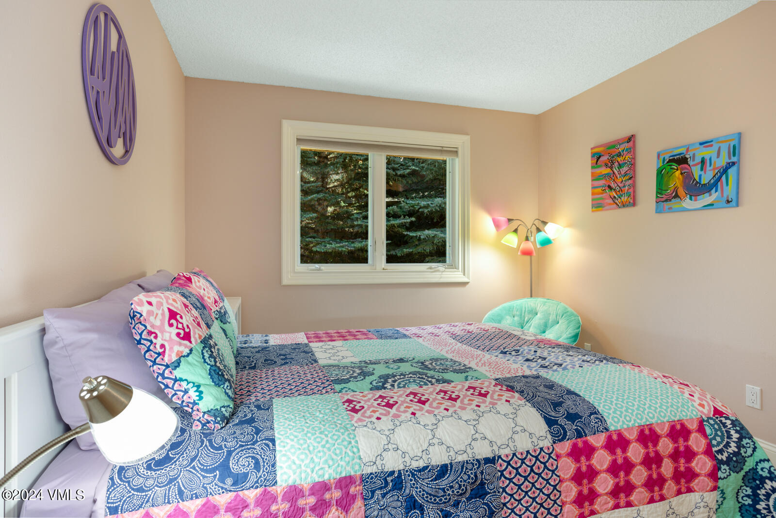 18 Beaver Road, Unit 1 Avon, CO 81620 - Photo 29 of 46 a bedroom with a bed and a window
