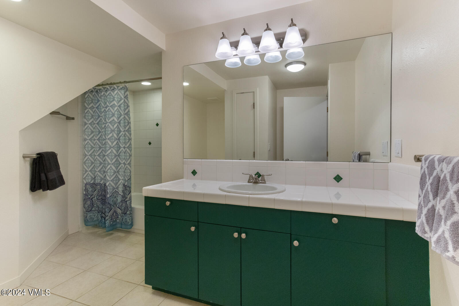 18 Beaver Road, Unit 1 Avon, CO 81620 - Photo 39 of 46 a spacious bathroom with a double vanity sink mirror and shower