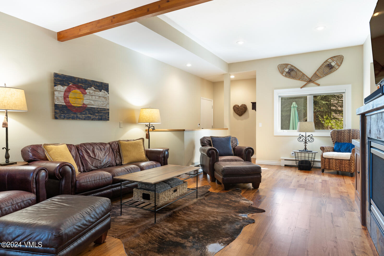 18 Beaver Road, Unit 1 Avon, CO 81620 - Photo 5 of 46 a living room with furniture and wooden floor