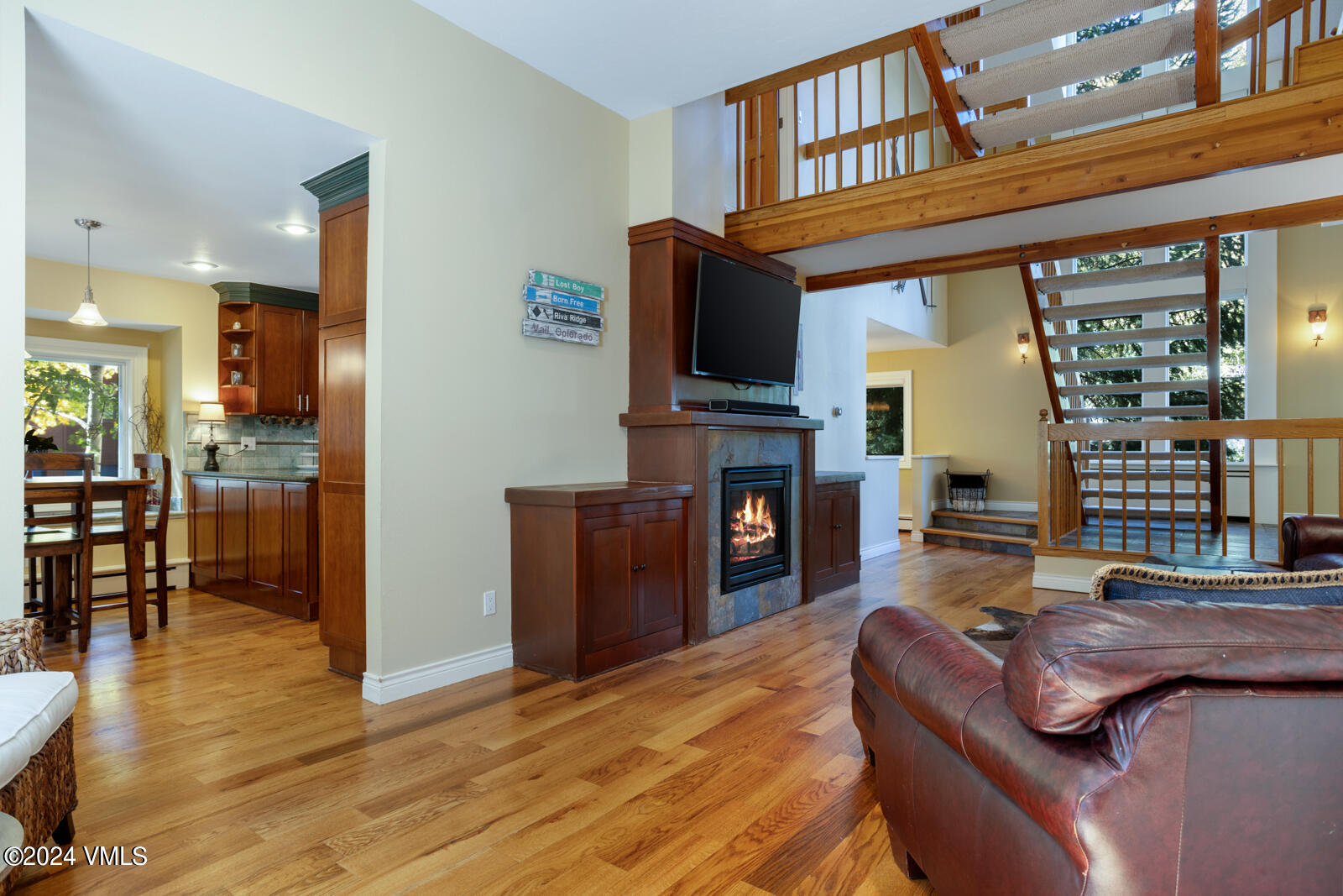 18 Beaver Road, Unit 1 Avon, CO 81620 - Photo 6 of 46 a living room with furniture and a flat screen tv