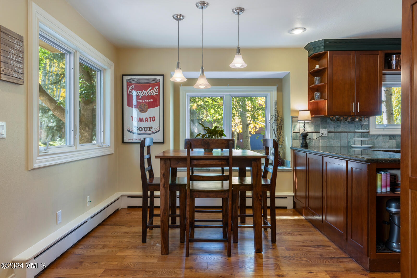 18 Beaver Road, Unit 1 Avon, CO 81620 - Photo 7 of 46 a view of a dining room with furniture window and wooden floor