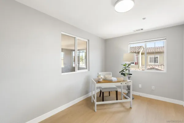 a living room with furniture and window