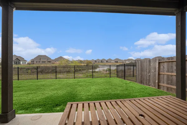 a view of a backyard and a garden