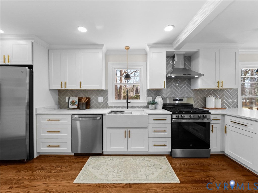 2501 Wildercroft Road Midlothian, VA 23113 - Photo 19 of 79 a kitchen with stainless steel appliances granite countertop a stove a sink dishwasher and a refrigerator