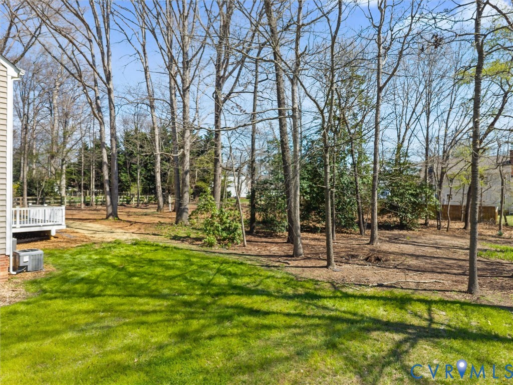 2501 Wildercroft Road Midlothian, VA 23113 - Photo 3 of 79 a view of a park with swings and a small yard