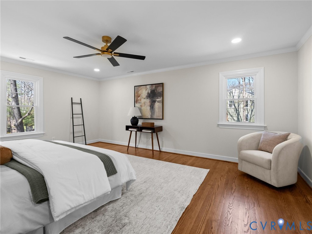 2501 Wildercroft Road Midlothian, VA 23113 - Photo 36 of 79 a bedroom with a bed and a couch