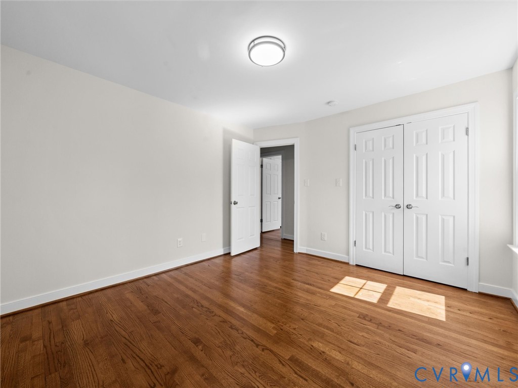 2501 Wildercroft Road Midlothian, VA 23113 - Photo 50 of 79 a view of an empty room with wooden floor