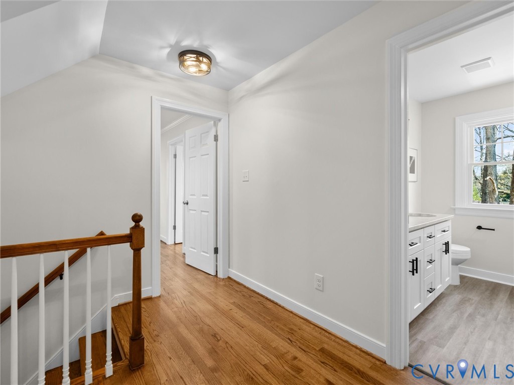 2501 Wildercroft Road Midlothian, VA 23113 - Photo 51 of 79 a view of a hallway with wooden floor and stairs