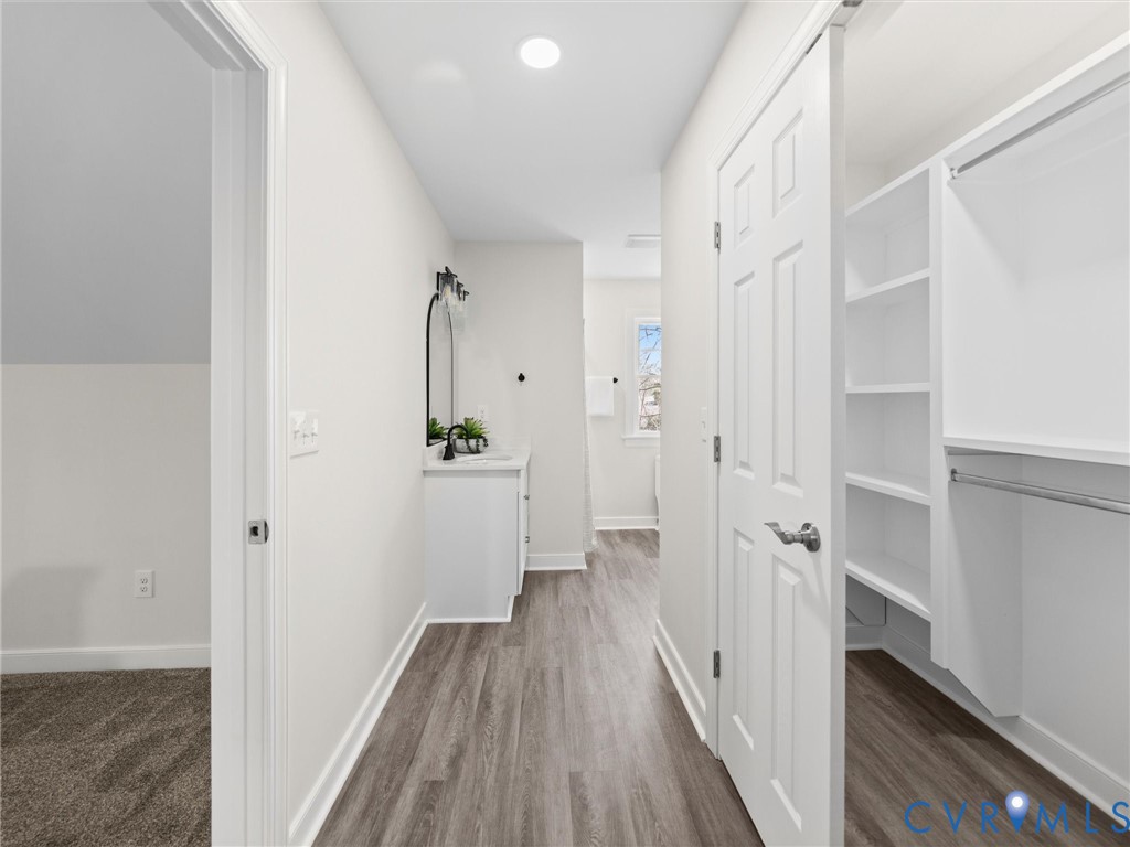 2501 Wildercroft Road Midlothian, VA 23113 - Photo 59 of 79 a view of a hallway with wooden floor and staircase