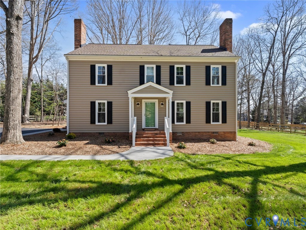 2501 Wildercroft Road Midlothian, VA 23113 - Photo 7 of 79 a front view of a house with a yard