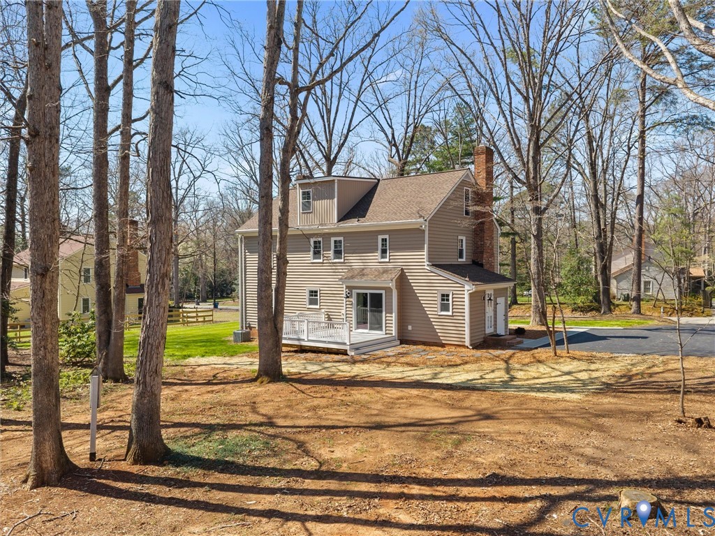 2501 Wildercroft Road Midlothian, VA 23113 - Photo 75 of 79 a view of a house with a yard covered with snow in the yard