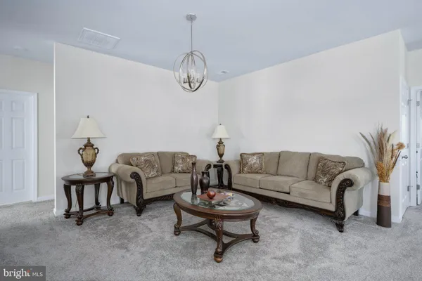 a bathroom with a double vanity sink and mirror