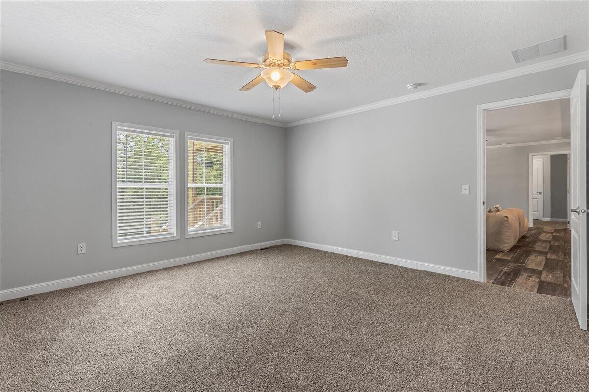 1629 Wasson Road Ten Mile, TN 37880 - Photo 18 of 27 a view of an empty room with a window