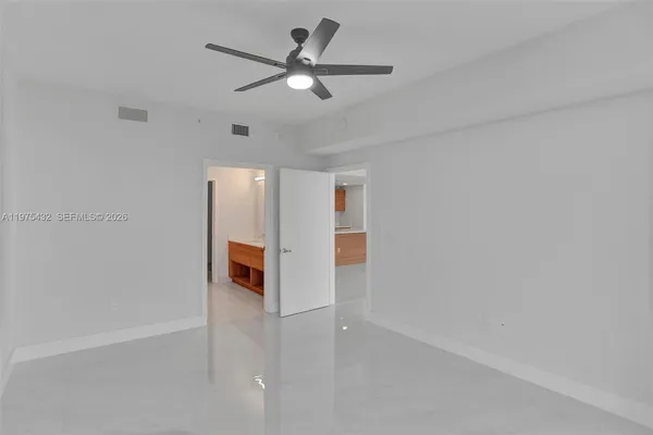 a view of a livingroom with a ceiling fan