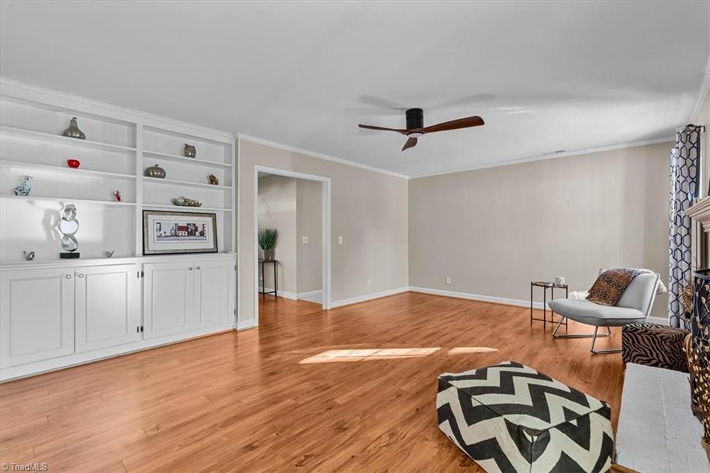 4511 Graham Road Greensboro, NC 27410 - Photo 23 of 49 Den with built in shelves and cabinets
