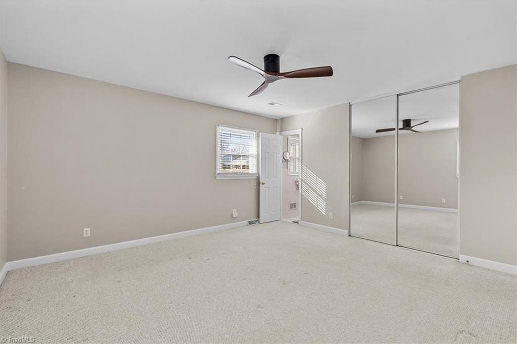 4511 Graham Road Greensboro, NC 27410 - Photo 27 of 49 Primary Bedroom with large closet and ensuite bath