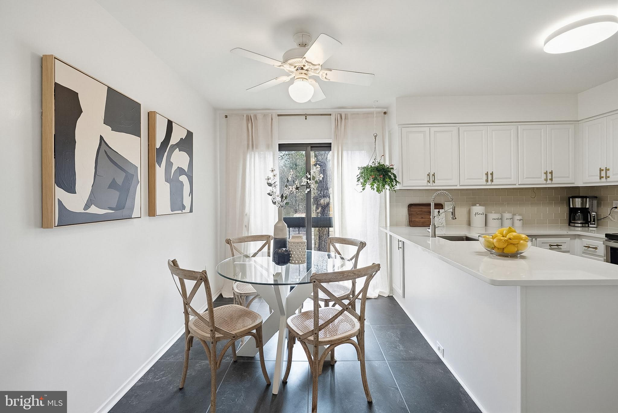 9060 Blarney Stone Drive Springfield, VA 22152 - Photo 11 of 47 a view of a dining room with furniture and wooden floor