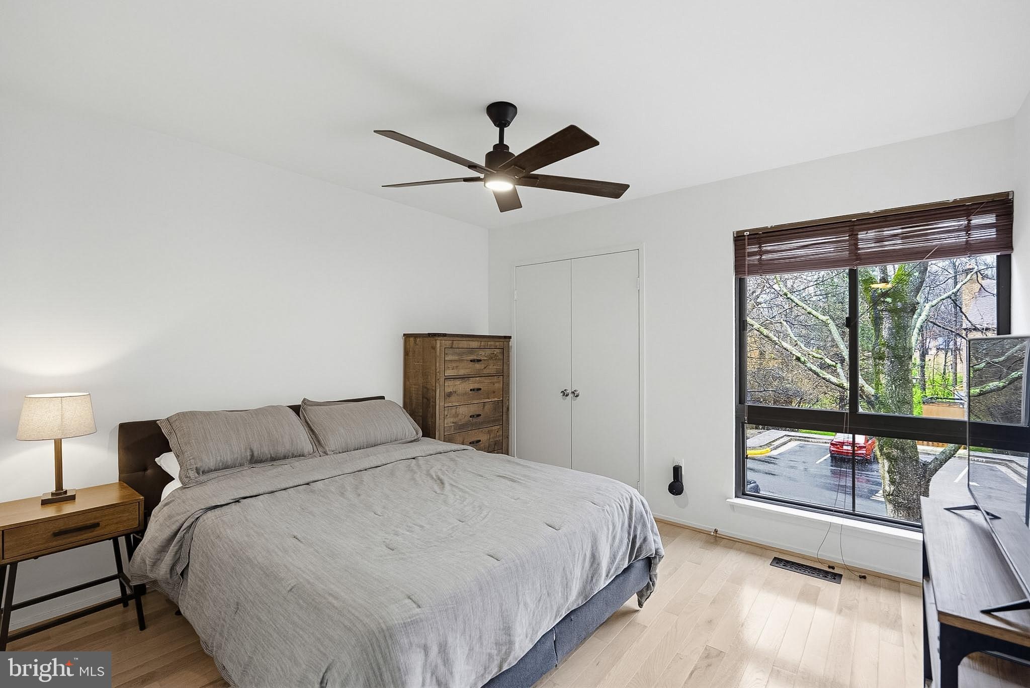 9060 Blarney Stone Drive Springfield, VA 22152 - Photo 27 of 47 a bedroom with a bed and a large window
