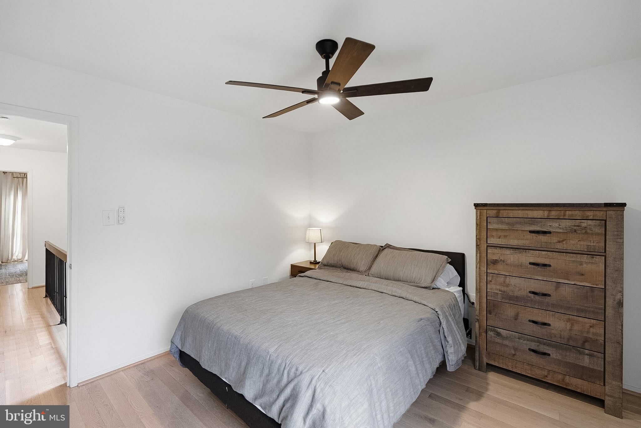 9060 Blarney Stone Drive Springfield, VA 22152 - Photo 28 of 47 a bedroom with a bed and a flat tv screen