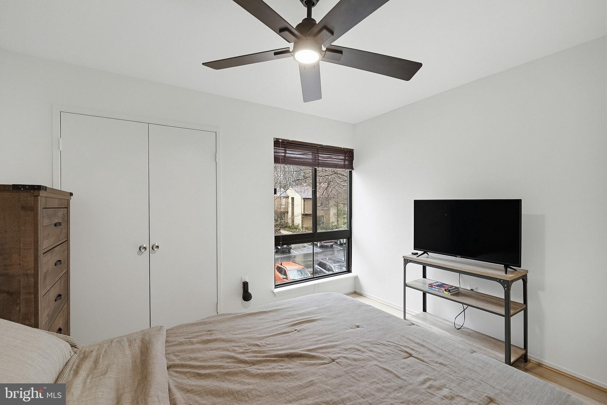 9060 Blarney Stone Drive Springfield, VA 22152 - Photo 33 of 47 a bedroom with a bed and a flat screen tv