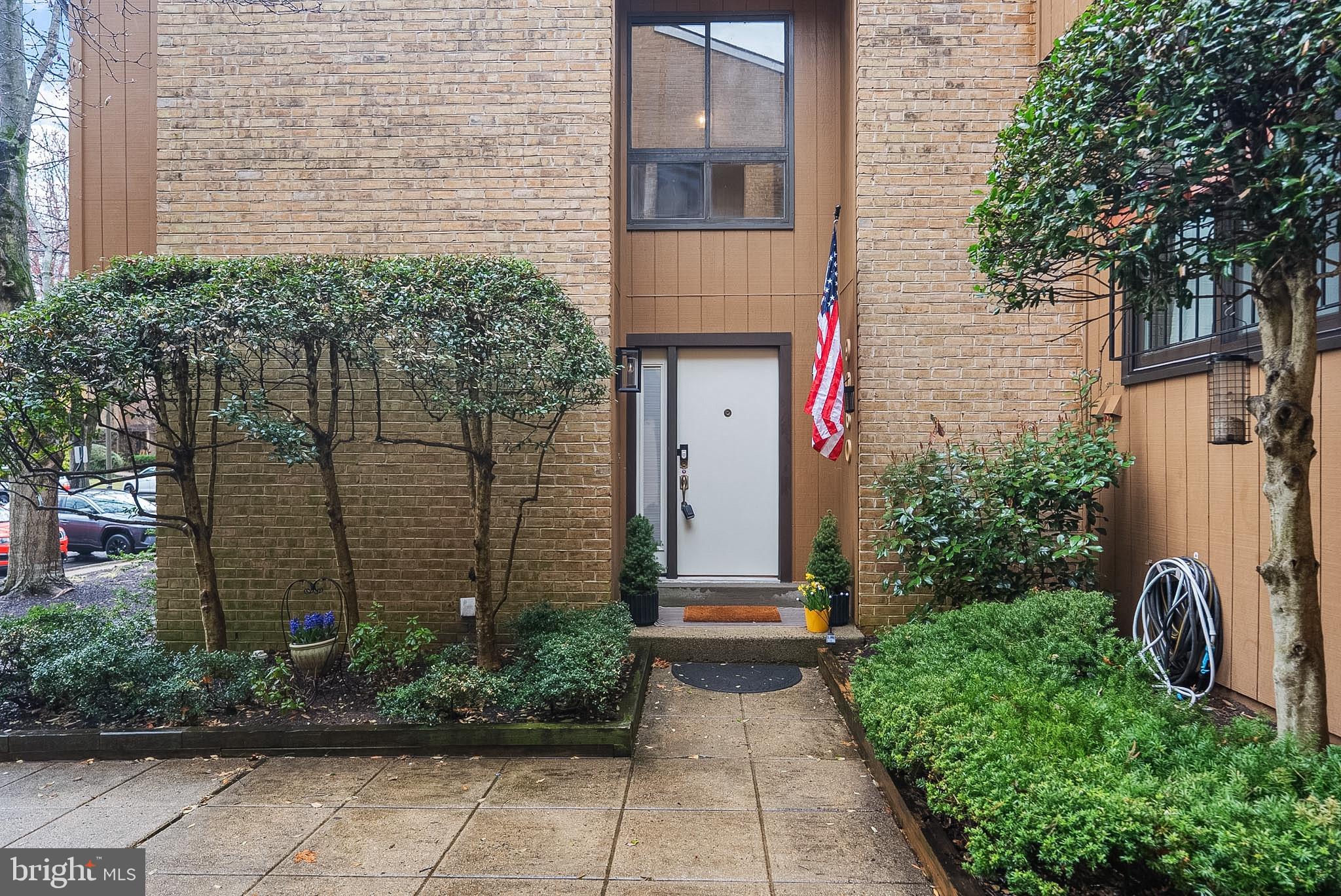 9060 Blarney Stone Drive Springfield, VA 22152 - Photo 42 of 47 a front view of a house with garden