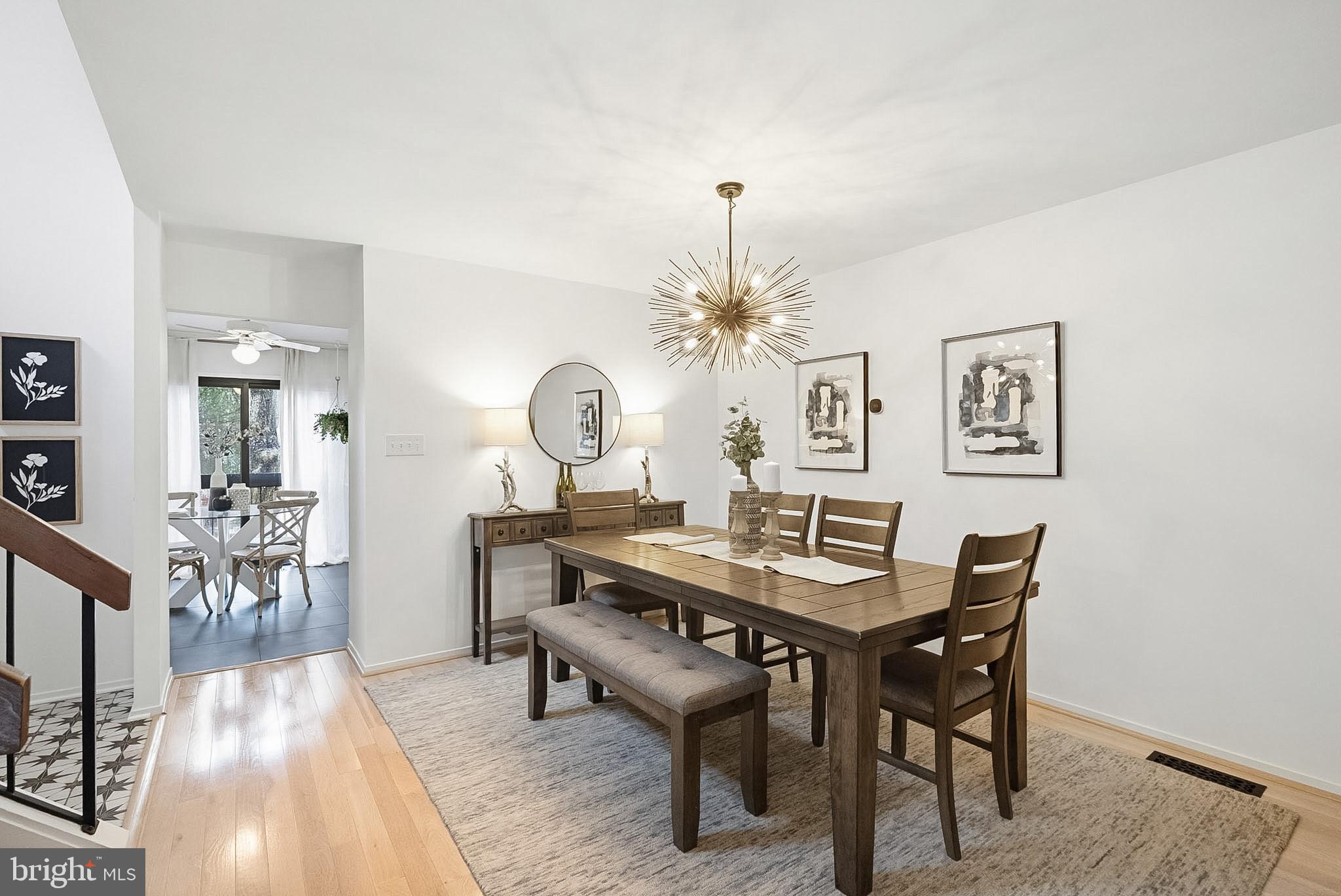 9060 Blarney Stone Drive Springfield, VA 22152 - Photo 10 of 47 a view of a dining room with furniture