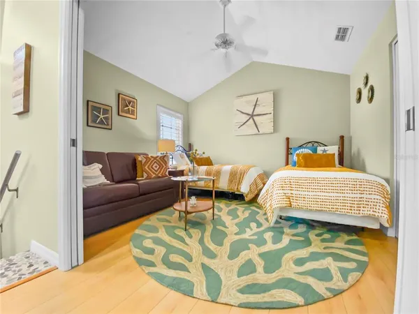 a bathroom with a toilet sink and shower