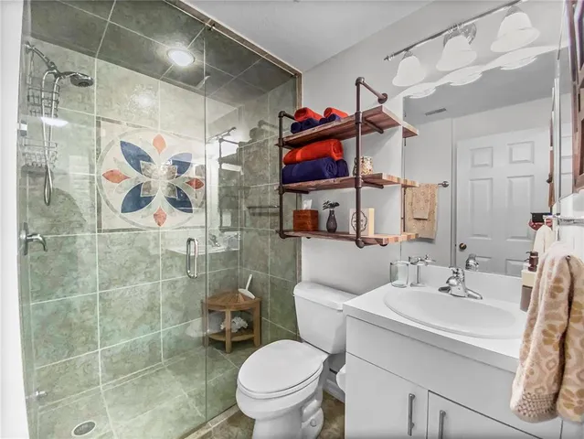 a view of a park with a palm trees