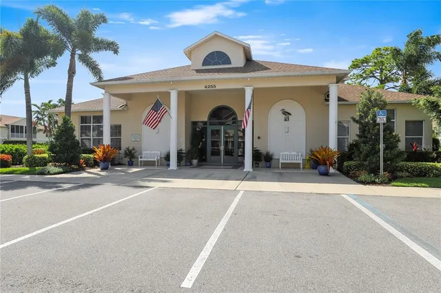 a view of a swimming pool with a patio