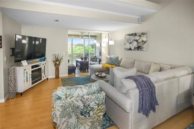 a bedroom with a bed and a chair