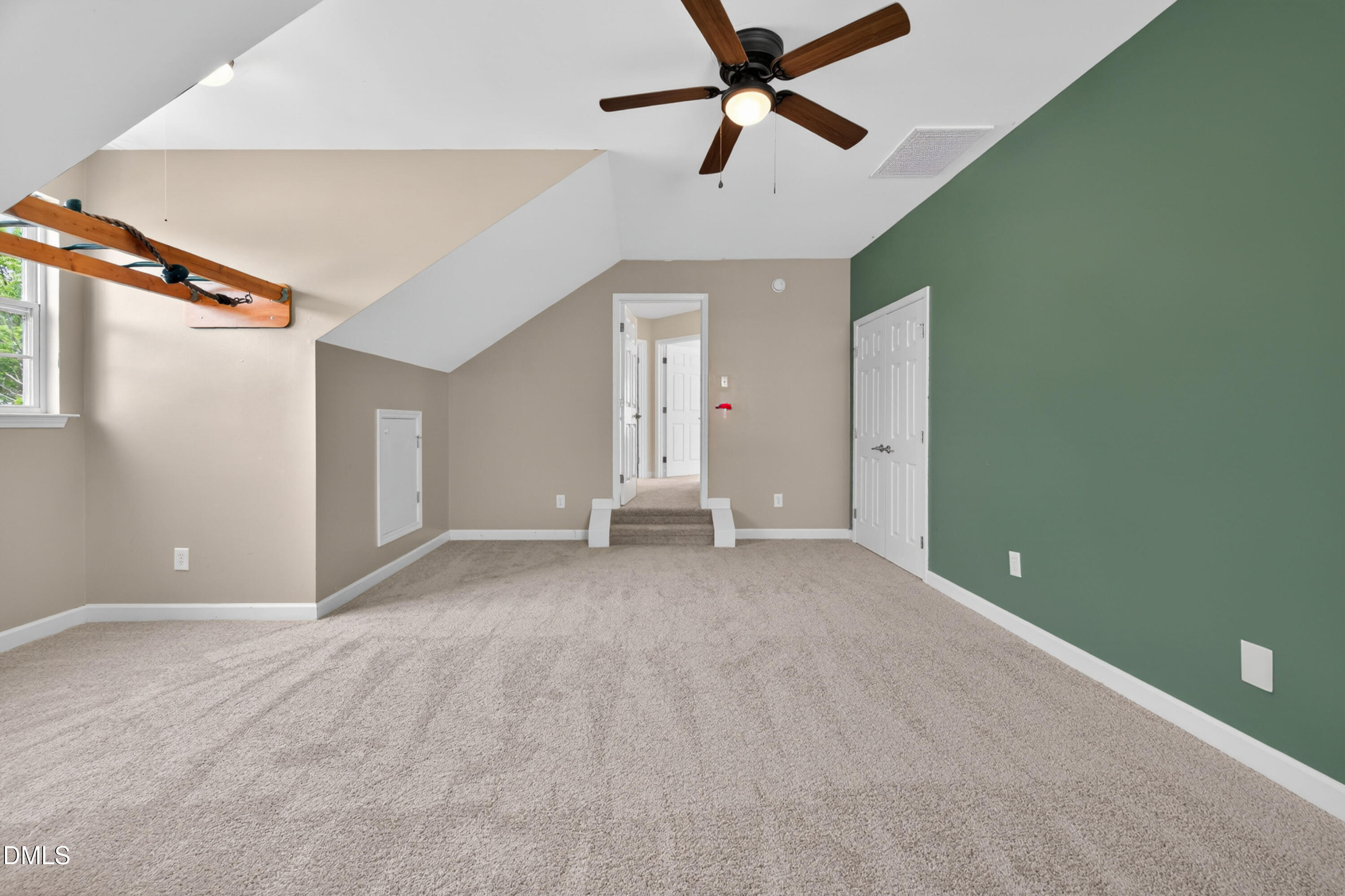 5304 Stone Station Drive Raleigh, NC 27616 - Photo 27 of 34 a view of a big room with closet and windows