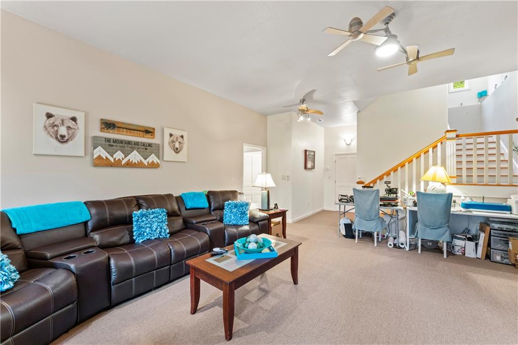 320 Holly Lane Walhalla, SC 29691 - Photo 35 of 41 This inviting living area features a warm ambiance, ideal for gatherings or quiet relaxation.