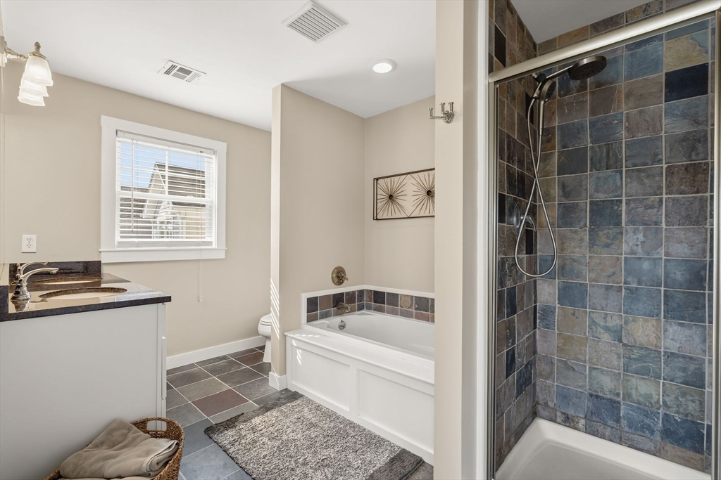 22 Pattison Road Webster, MA 01570 - Photo 21 of 42 a bathroom with a tub a sink a mirror and a shower