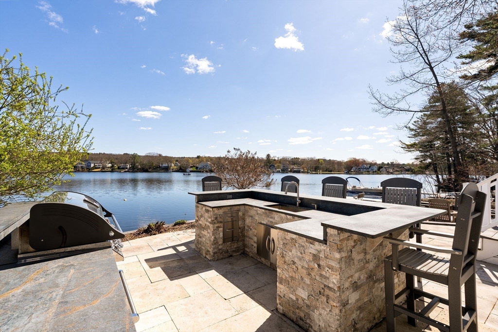 22 Pattison Road Webster, MA 01570 - Photo 29 of 42 a view of a terrace with sitting area