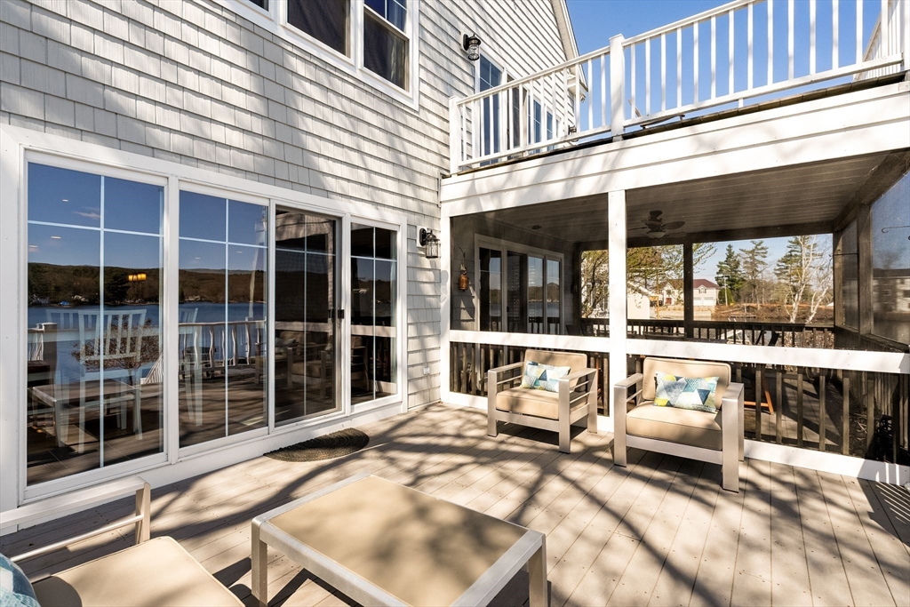 22 Pattison Road Webster, MA 01570 - Photo 31 of 42 a view of a building with sitting area