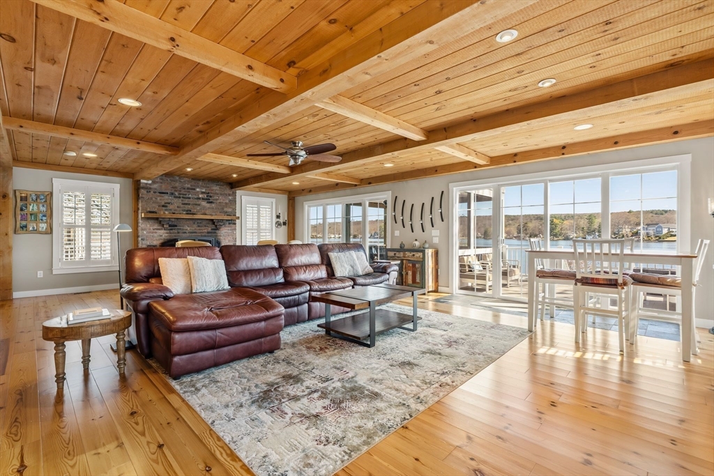 22 Pattison Road Webster, MA 01570 - Photo 7 of 42 a living room with furniture and wooden floor