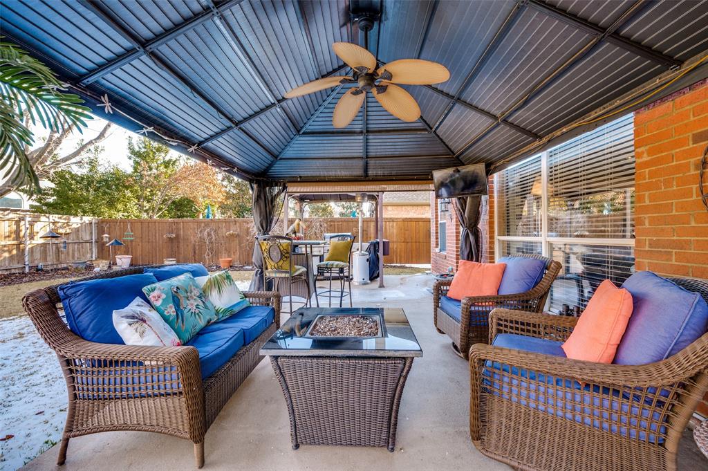 5904 Berkshire Road McKinney, TX 75072 - Photo 24 of 26 a outdoor living space with patio furniture and a potted plant