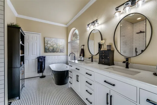 a bathroom with a double vanity sink double and a mirror