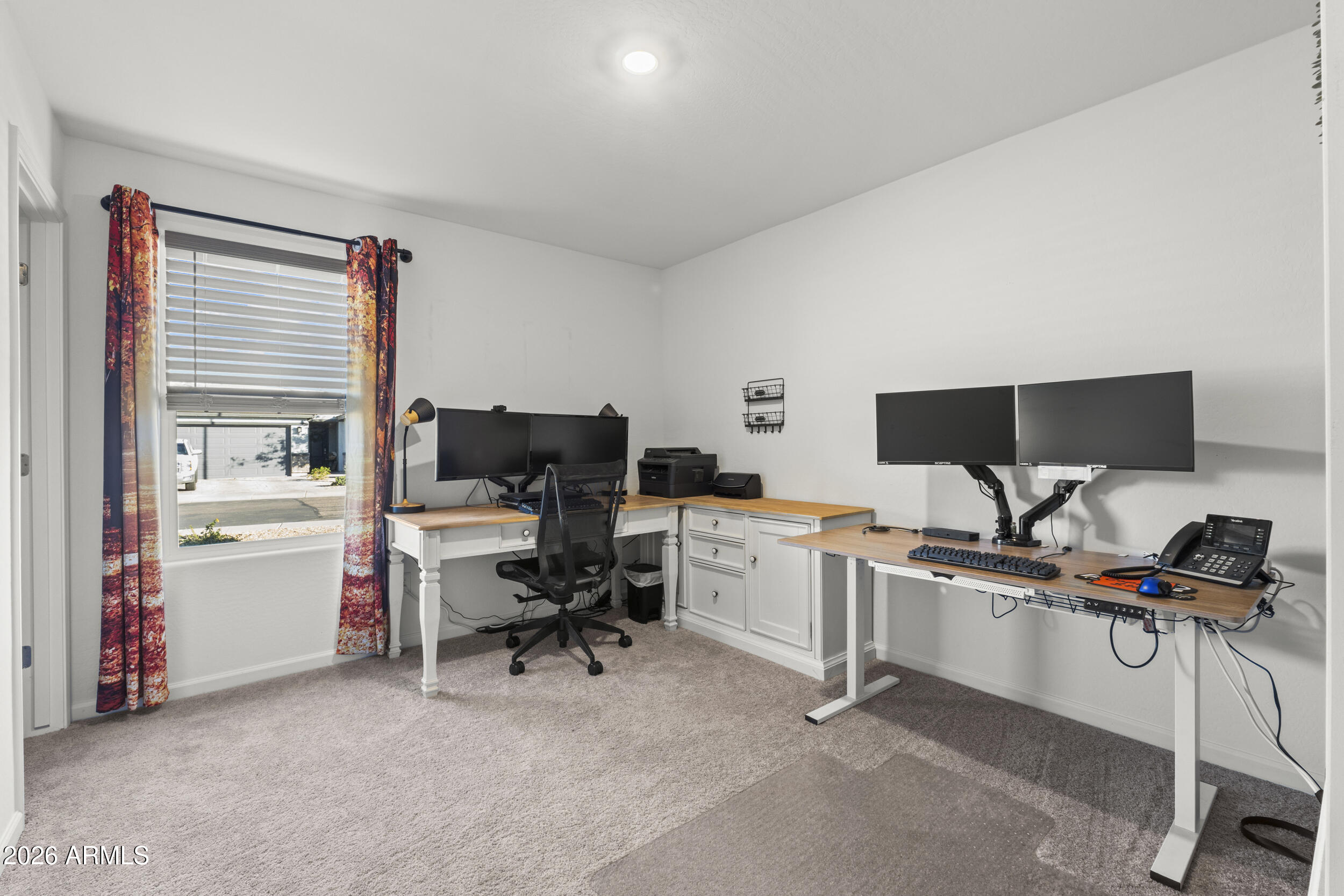 83 South Naples Lane Casa Grande, AZ 85122 - Photo 17 of 26 a view of a workspace with furniture and a window