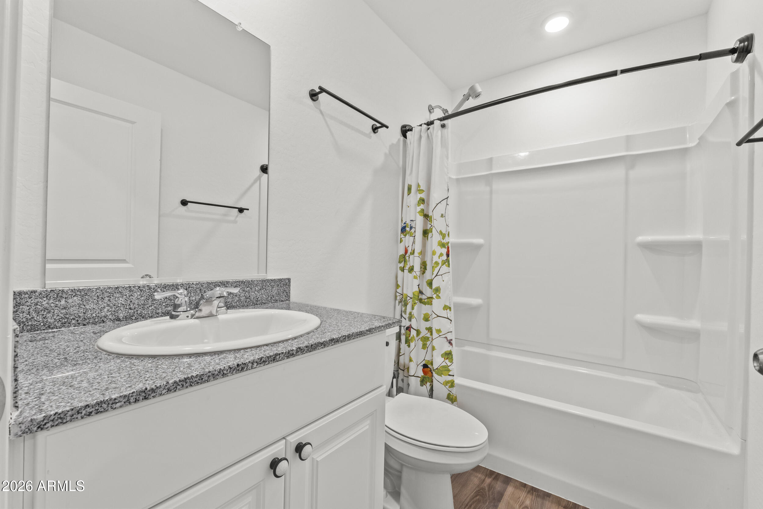 83 South Naples Lane Casa Grande, AZ 85122 - Photo 18 of 26 a bathroom with a granite countertop sink toilet and shower