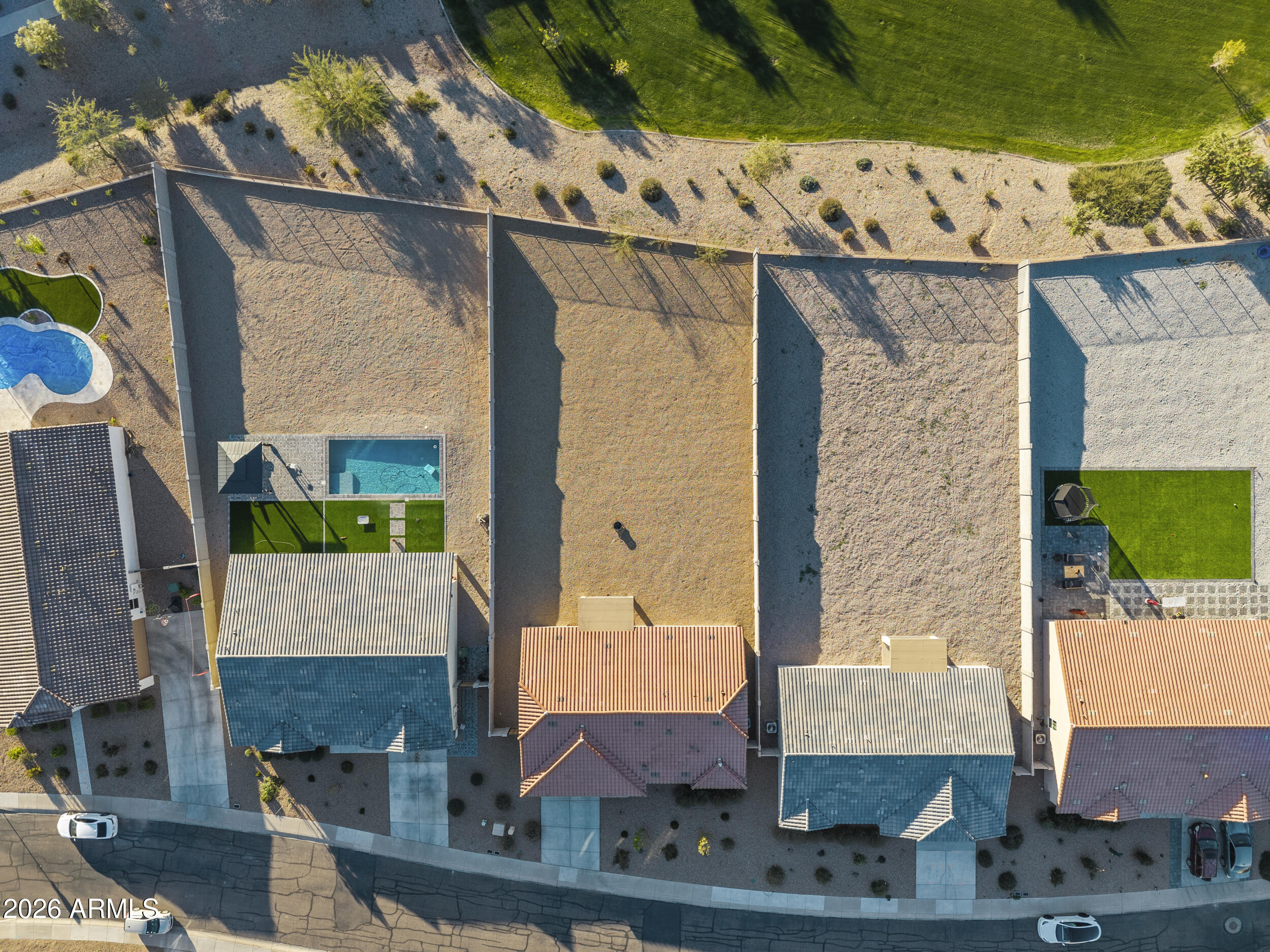 83 South Naples Lane Casa Grande, AZ 85122 - Photo 8 of 26 a aerial view of a house with a garden and parking space