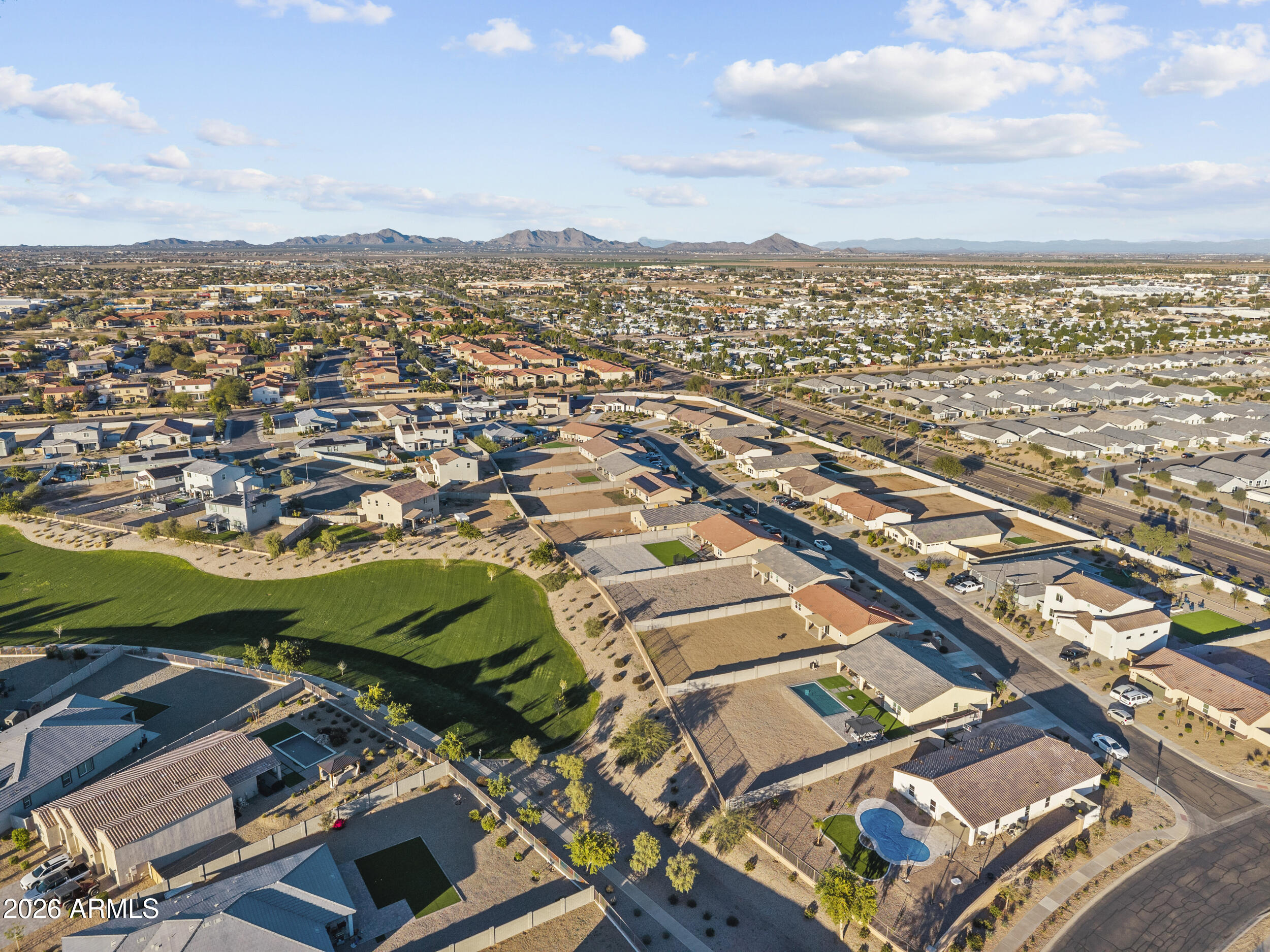 83 South Naples Lane Casa Grande, AZ 85122 - Photo 9 of 26 an aerial view of residential building and lake