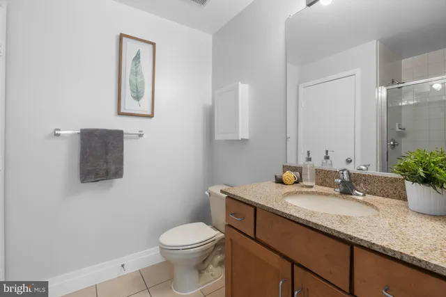 a room with a sink and a mirror