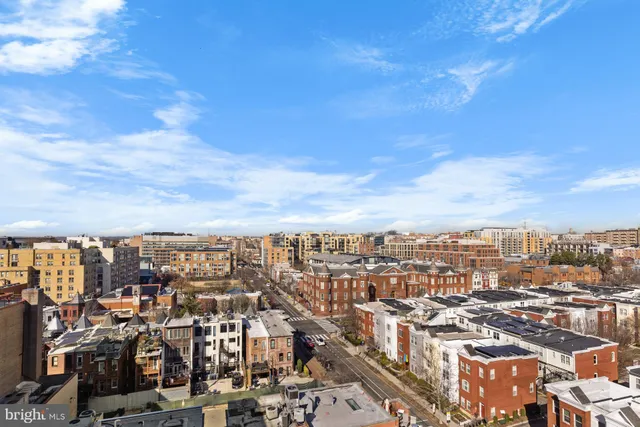 a view of a building and a street