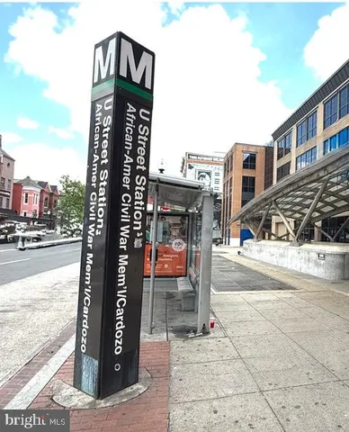 a sign on the side of the road