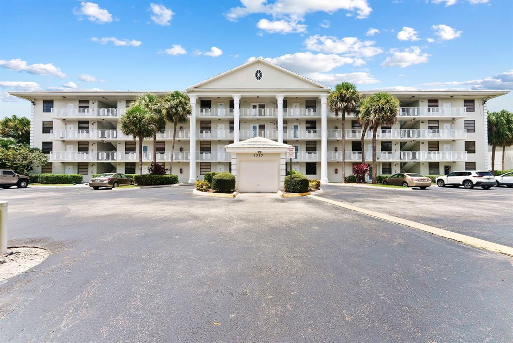 1717 Whitehall Drive, Unit 205 Davie, FL 33324 - Photo 1 of 18 a view of a building with a street