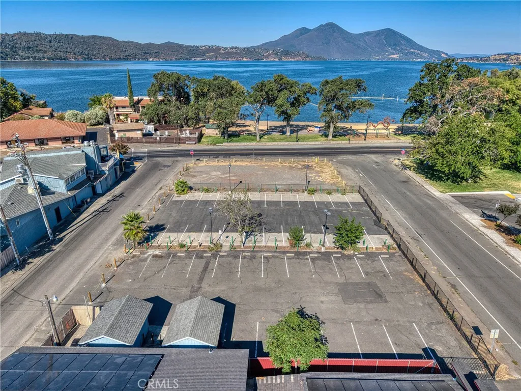 14050 Division Clearlake, CA 95422 - Photo 2 of 15 a view of a swimming pool with a table and chairs