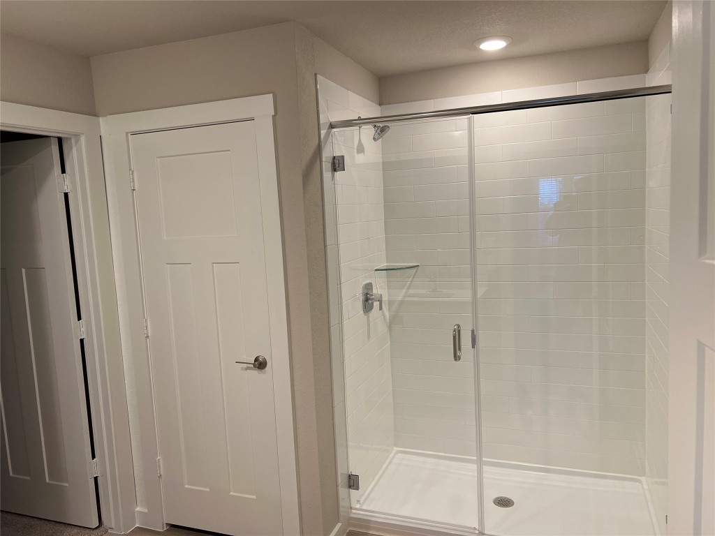 404 Coda Crossing Georgetown, TX 78633 - Photo 7 of 15 Bathroom with a stall shower