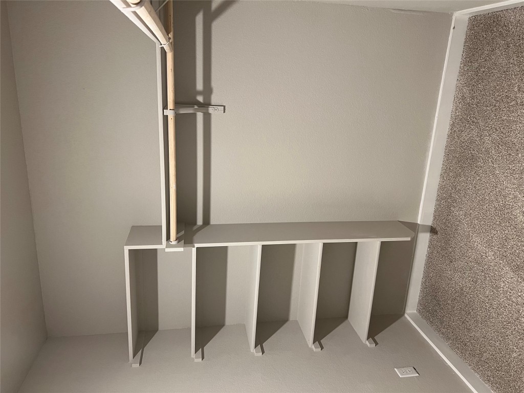 404 Coda Crossing Georgetown, TX 78633 - Photo 9 of 15 Spacious closet with light colored carpet