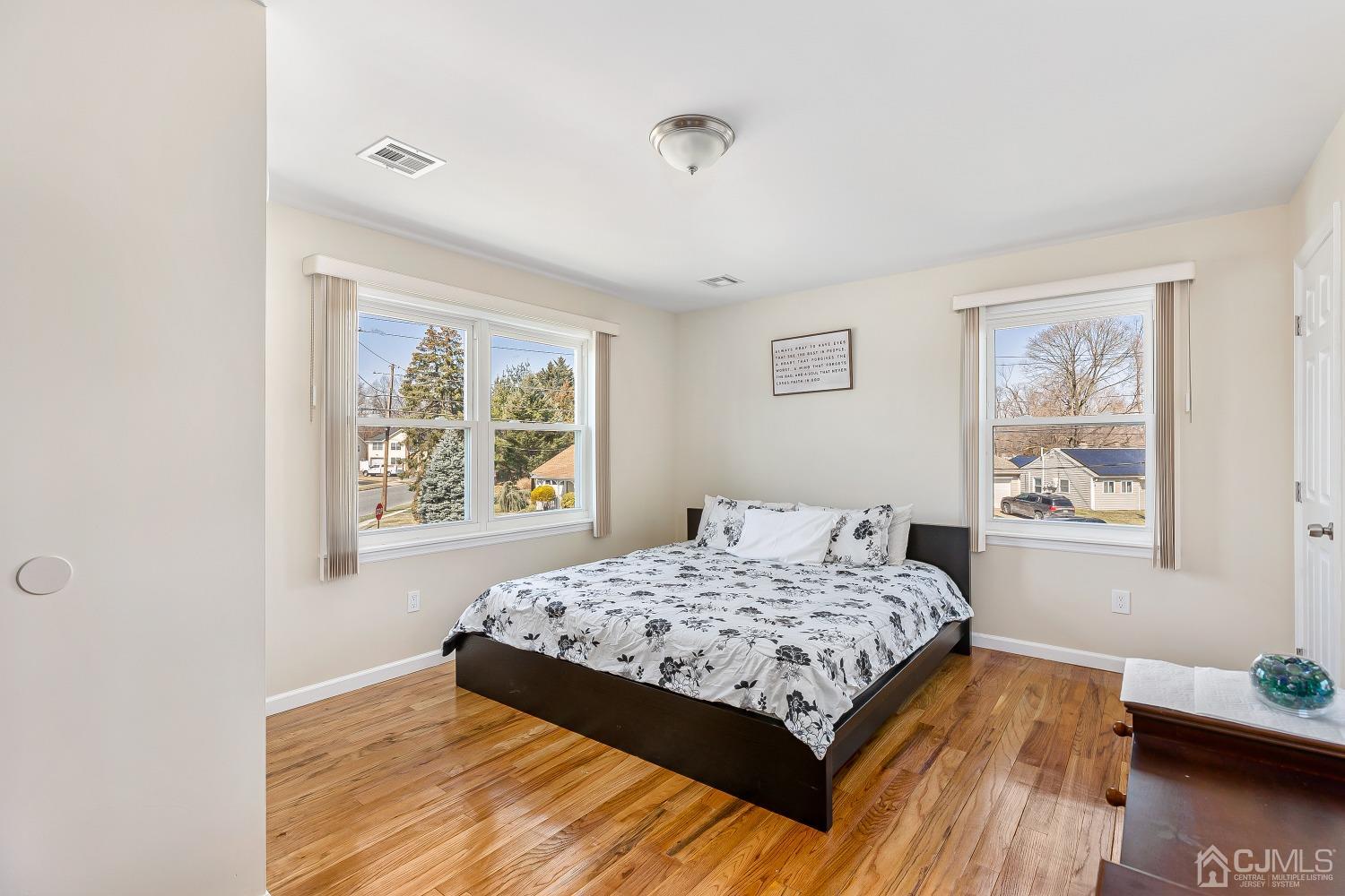 39 Miko Road Edison, NJ 08817 - Photo 14 of 22 a bedroom with a large bed and a window